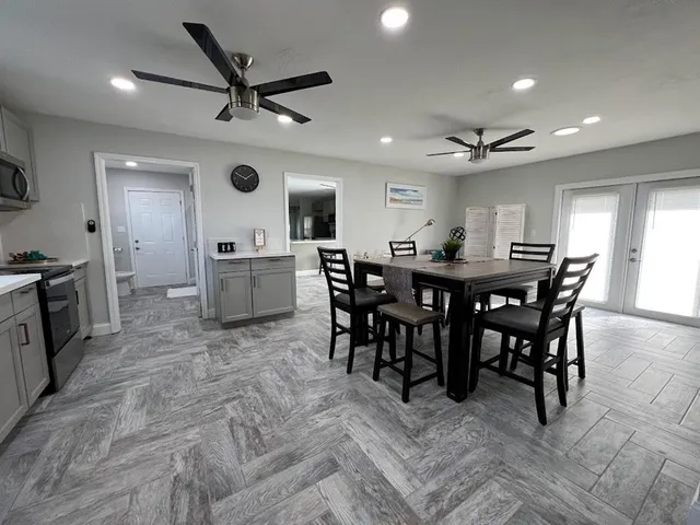 a view of a dining room with furniture