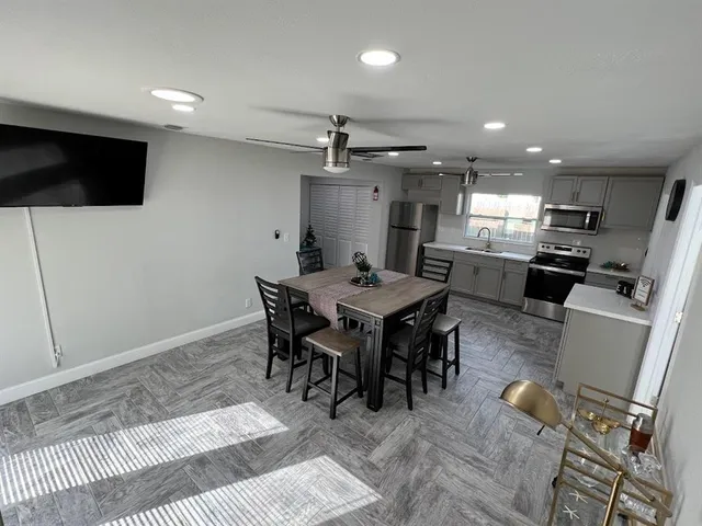 a view of a dining room with furniture