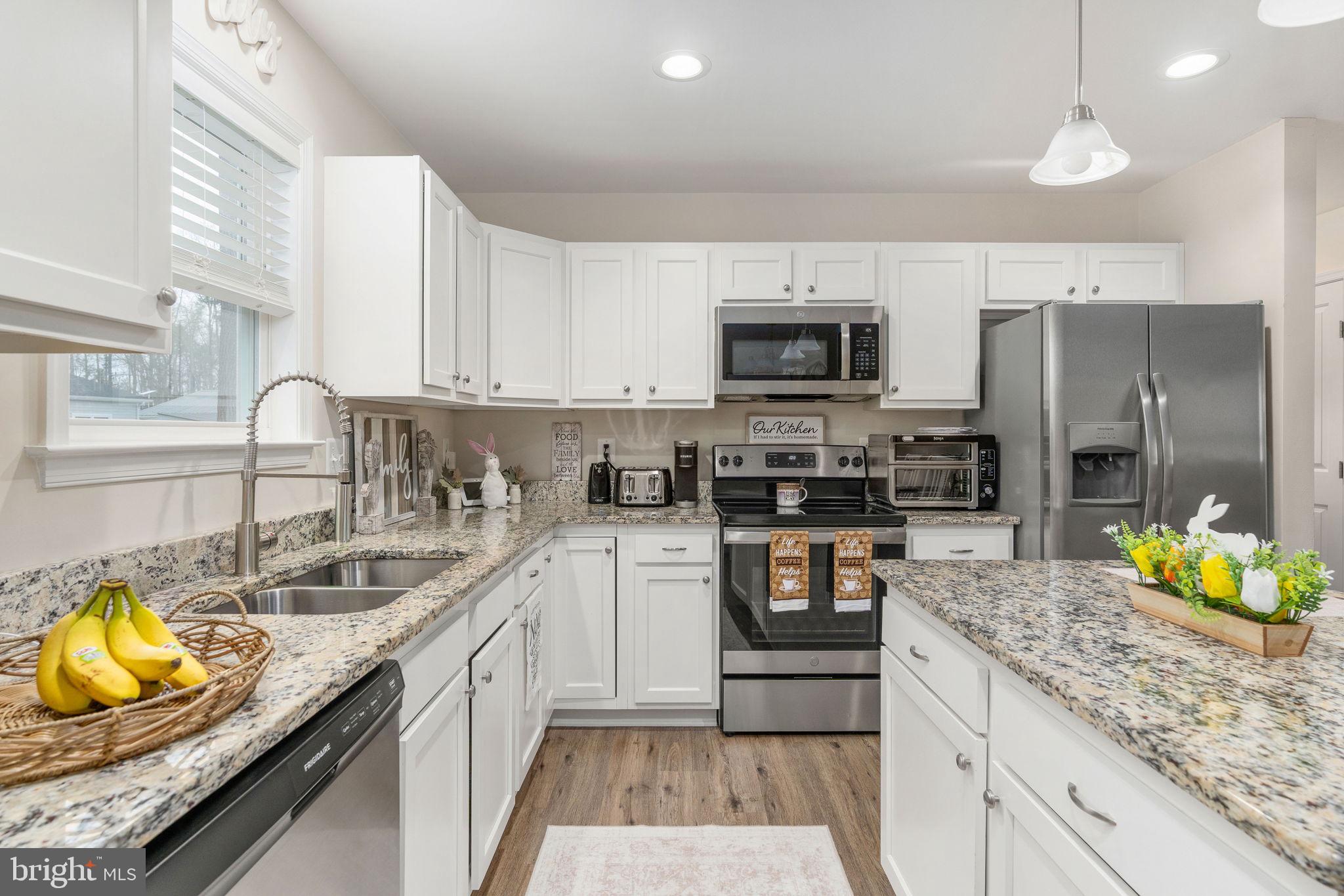 78 Rustic Lane Colonial Beach, VA 22443 - Photo 21 of 56 Modern kitchen with elegant finishes.