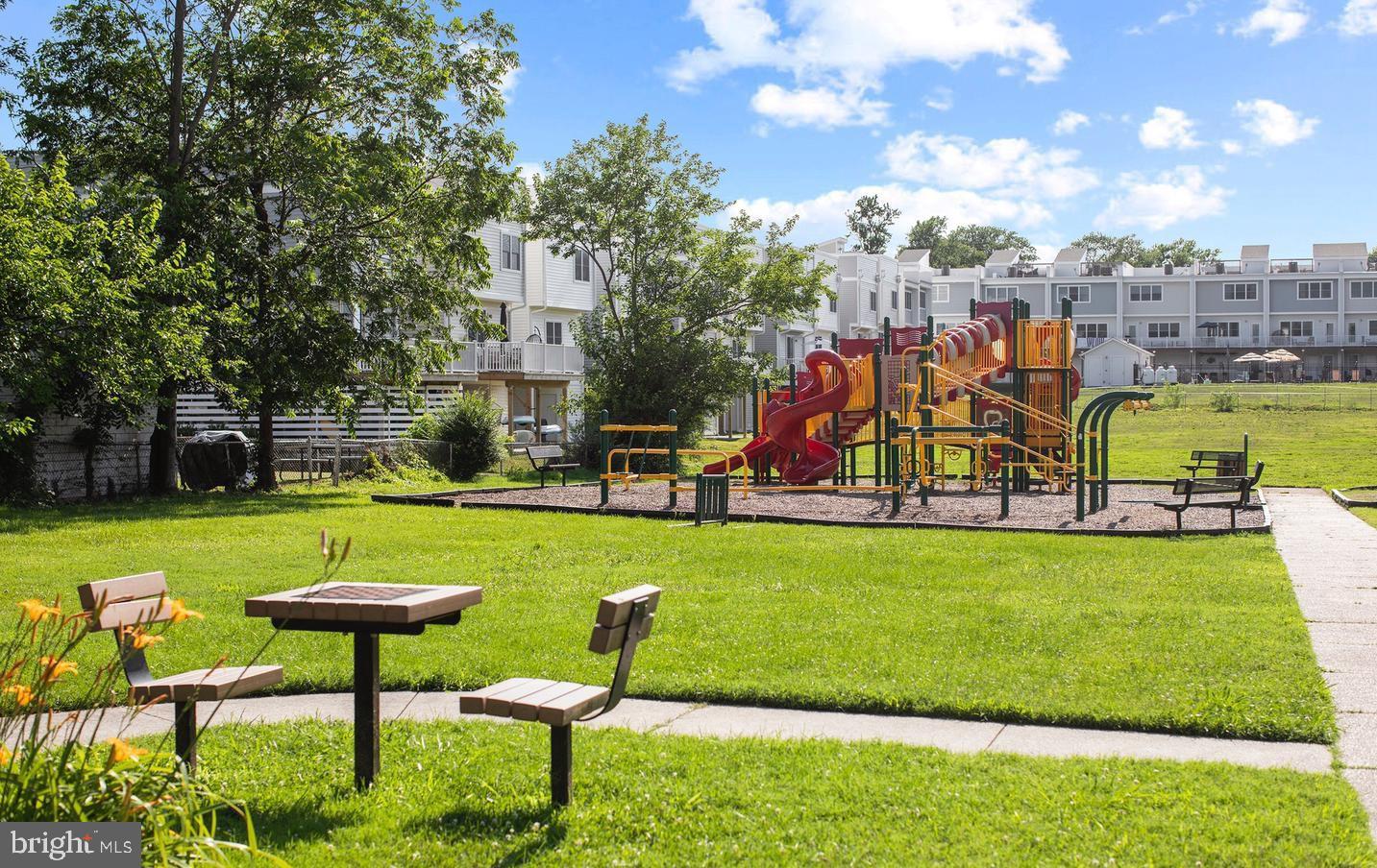 78 Rustic Lane Colonial Beach, VA 22443 - Photo 44 of 56 Vibrant playground in sunny green space.
