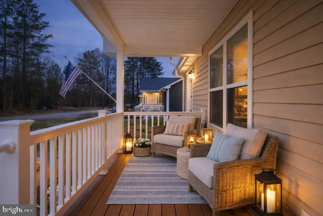 78 Rustic Lane Colonial Beach, VA 22443 - Photo 8 of 56 Charming porch with evening glow.