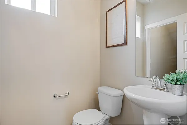 a workspace with furniture and a window