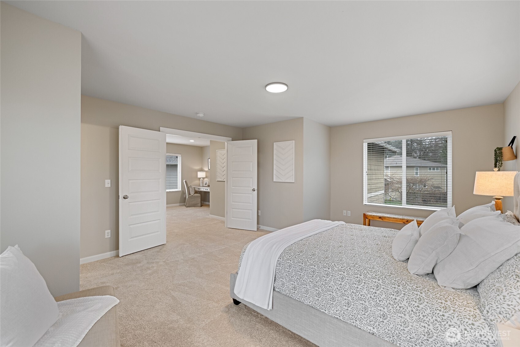 1016 207th Street Southwest Lynnwood, WA 98036 - Photo 18 of 39 a bedroom with a large bed and a window