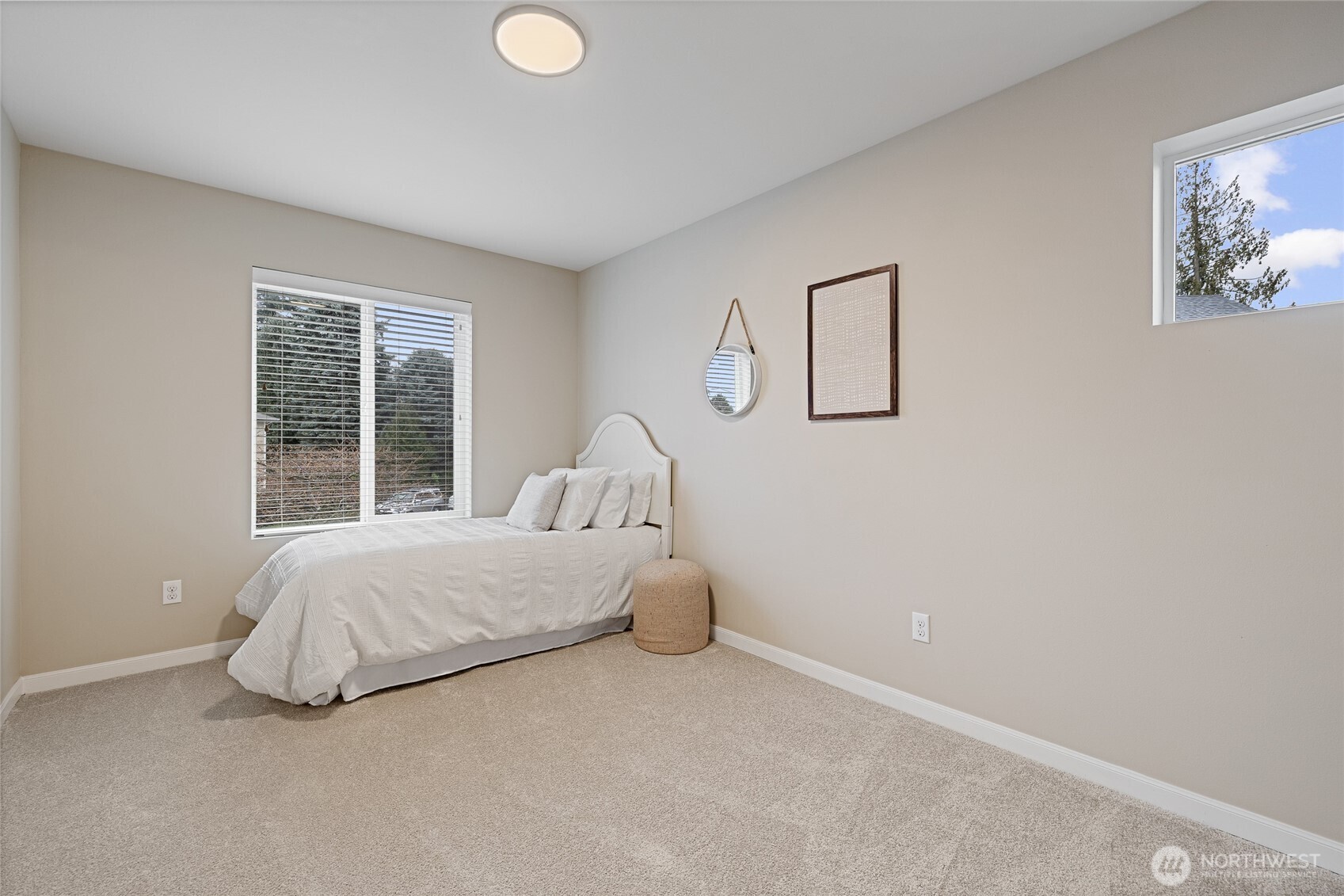 1016 207th Street Southwest Lynnwood, WA 98036 - Photo 25 of 39 a bedroom with a bed and window