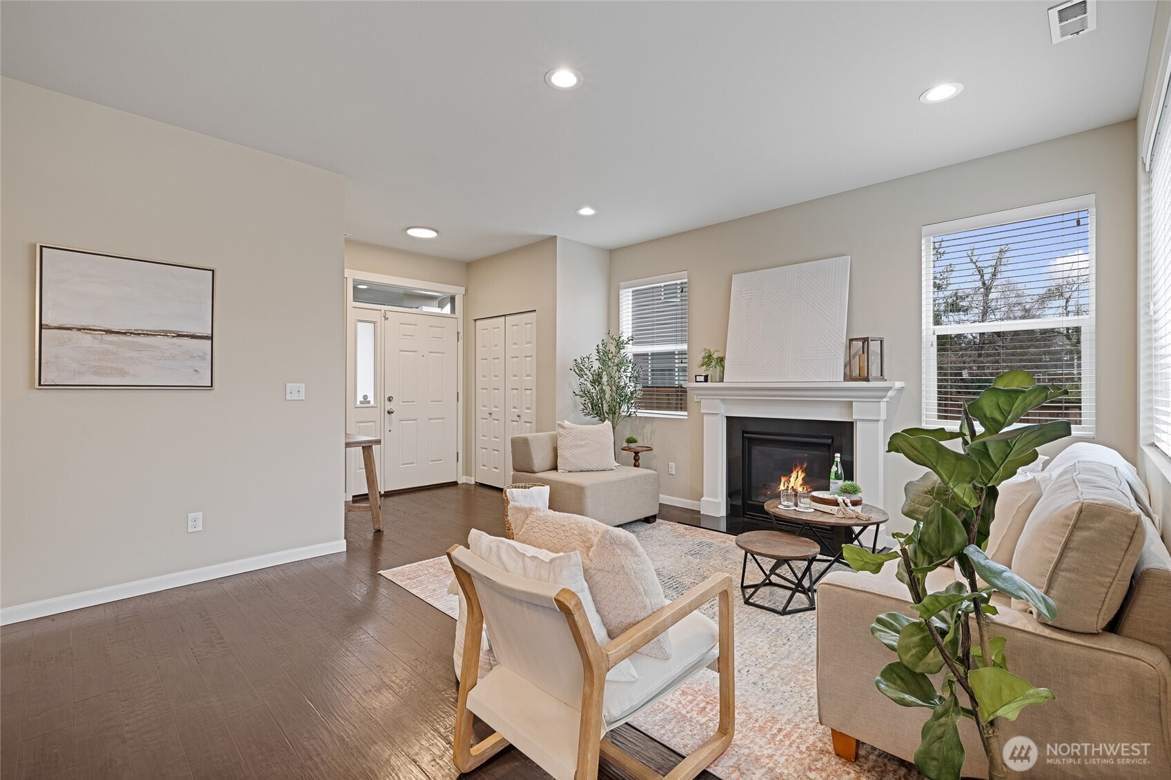 1016 207th Street Southwest Lynnwood, WA 98036 - Photo 5 of 39 a living room with furniture and a fireplace