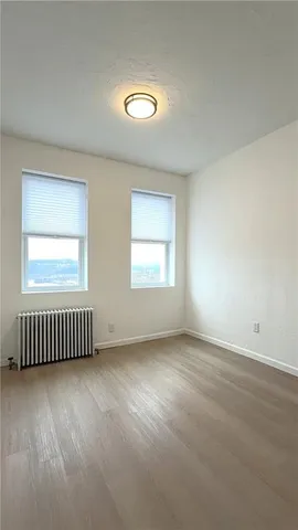 an empty room with windows