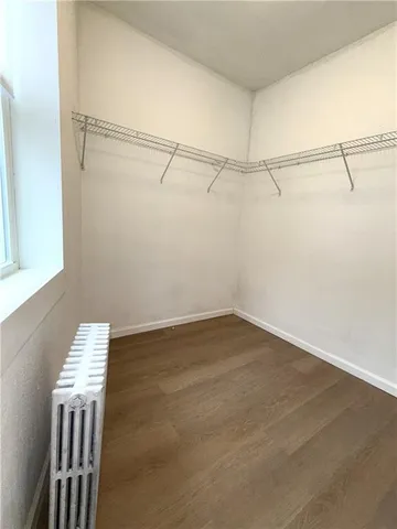 a view of a room with racks on the wall