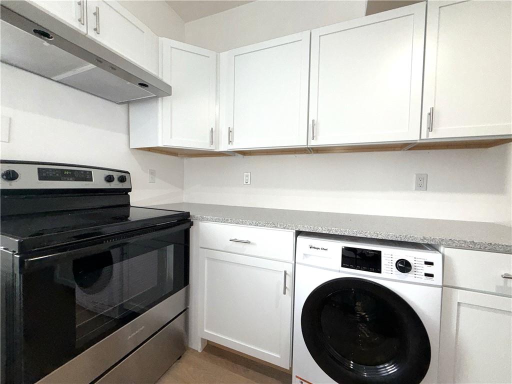 3367 Ridgway Street Pittsburgh, PA 15213 - Photo 9 of 16 a kitchen with a stove top oven and cabinets