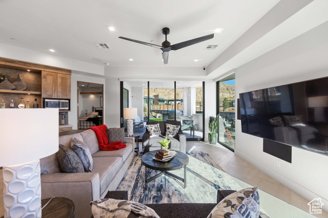 3558 South Cypress Road Hurricane, UT 84737 - Photo 30 of 57 Living room featuring ceiling fan