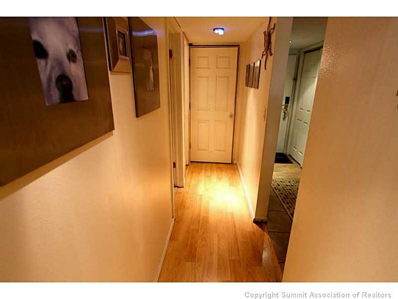 800 Copper Road, Unit 178 Copper Mountain, CO 80443 - Photo 5 of 19 a view of hallway with wooden floor