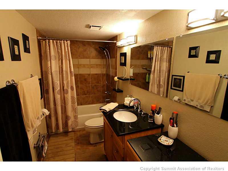 800 Copper Road, Unit 178 Copper Mountain, CO 80443 - Photo 10 of 19 a bathroom with a sink toilet and shower
