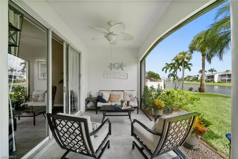 a outdoor living space with furniture and a potted plant