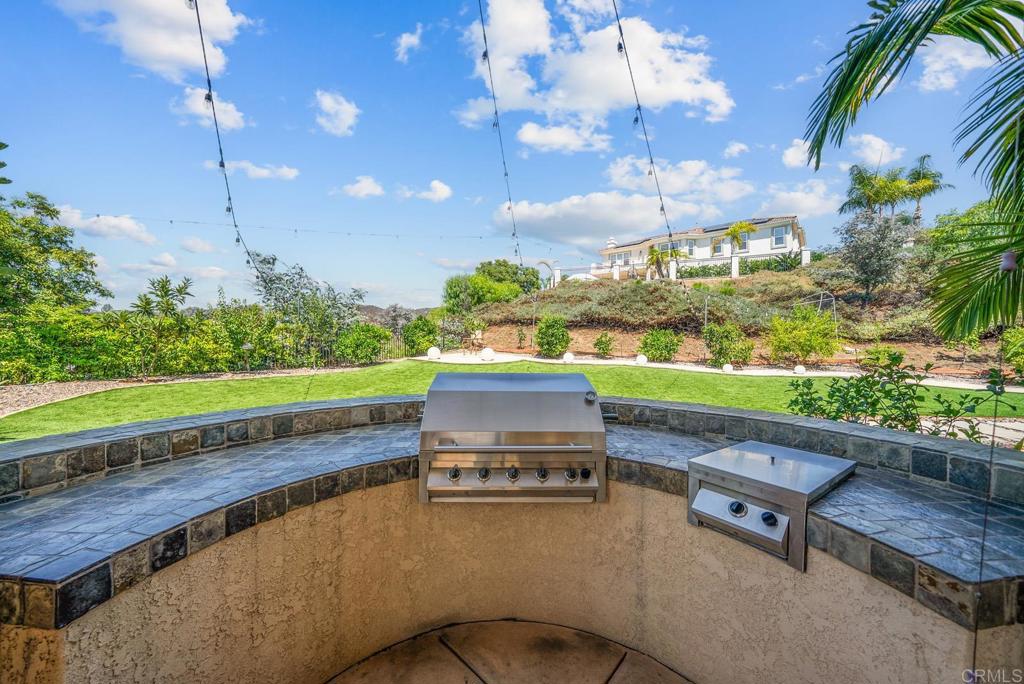 13251 Devon Drive Jamul, CA 91935 - Photo 19 of 73 a view of a swimming pool with a yard