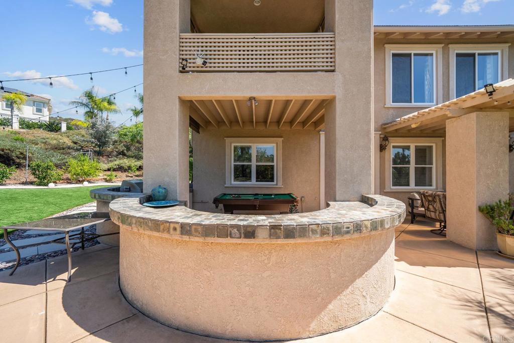 13251 Devon Drive Jamul, CA 91935 - Photo 21 of 73 a view of a house with backyard fountain and sitting area