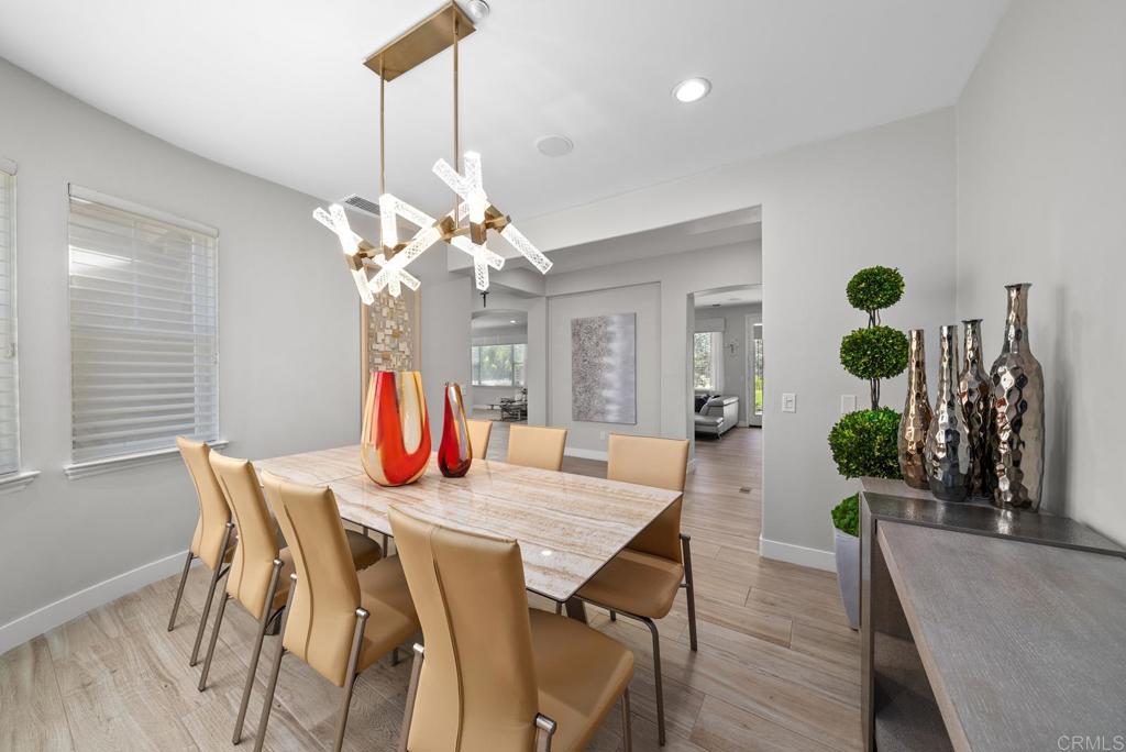 13251 Devon Drive Jamul, CA 91935 - Photo 25 of 73 a view of a dining room with furniture and wooden floor