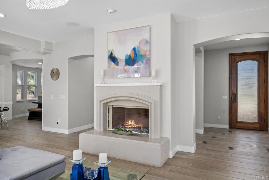13251 Devon Drive Jamul, CA 91935 - Photo 36 of 73 a living room with furniture and a fireplace