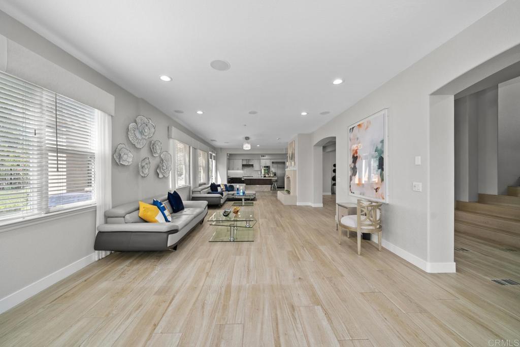 13251 Devon Drive Jamul, CA 91935 - Photo 40 of 73 a living room with furniture and a wooden floor