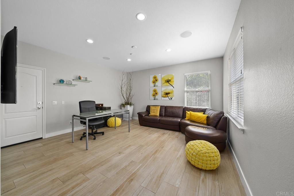 13251 Devon Drive Jamul, CA 91935 - Photo 47 of 73 a living room with furniture and wooden floor