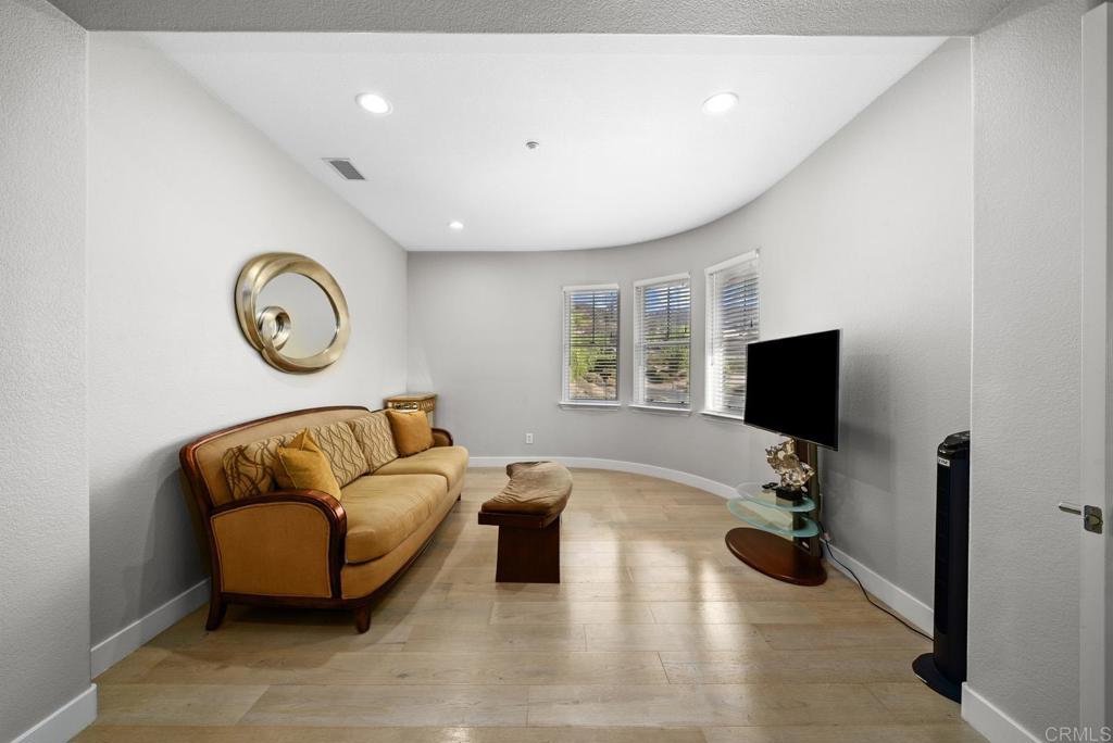 13251 Devon Drive Jamul, CA 91935 - Photo 61 of 73 a living room with furniture and a flat screen tv