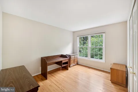 a room with furniture and a window