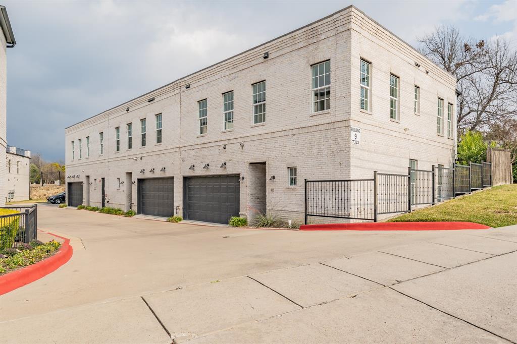 7333 Valley View Lane, Unit 902 Dallas, TX 75240 - Photo 33 of 40 a front view of building with yard