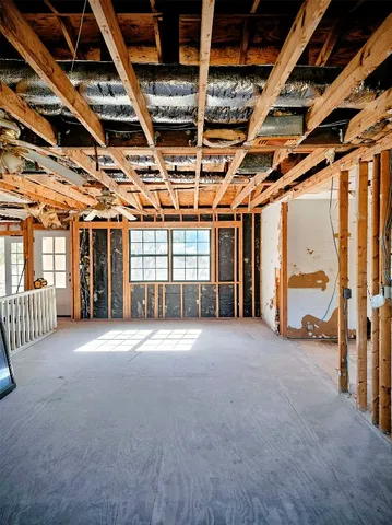 a view of balcony with wooden floor