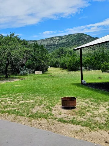 a view of a lake with a mountain
