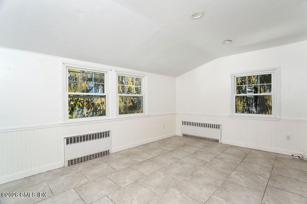 198 Valley Road Cos Cob, CT 06807 - Photo 11 of 31 a view of an empty room with a window