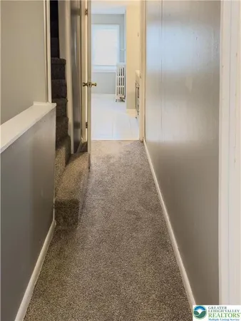 a bedroom with a bed and a cabinets