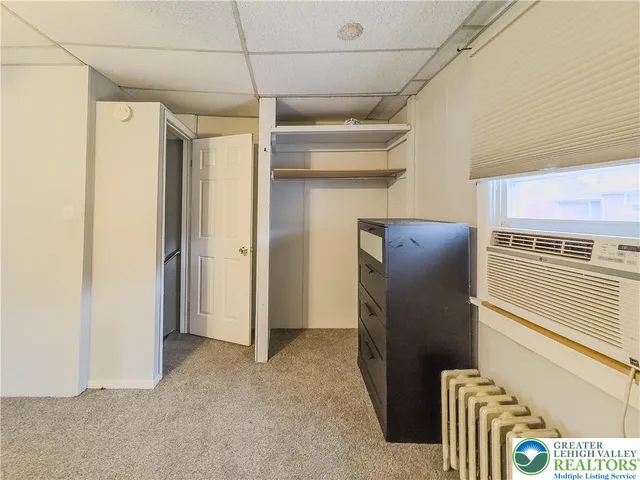 a view of a chairs and table in the patio