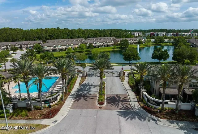 a view of a swimming pool with a patio