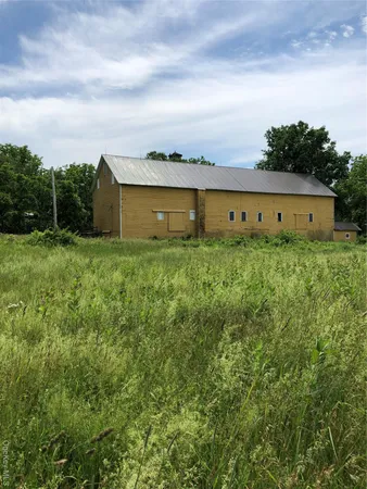 a picture of mountains in front of house