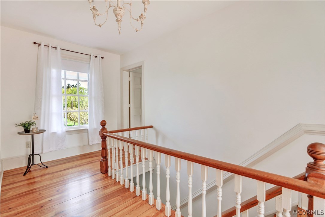 5503 Ruffin Road Prince George, VA 23875 - Photo 15 of 48 Upstairs hall with refinished floors on both level