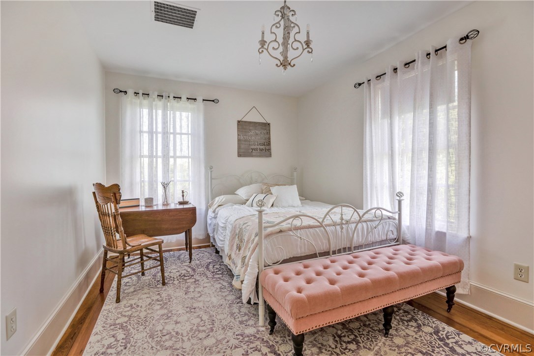5503 Ruffin Road Prince George, VA 23875 - Photo 17 of 48 Second bedroom with vintage light fixture