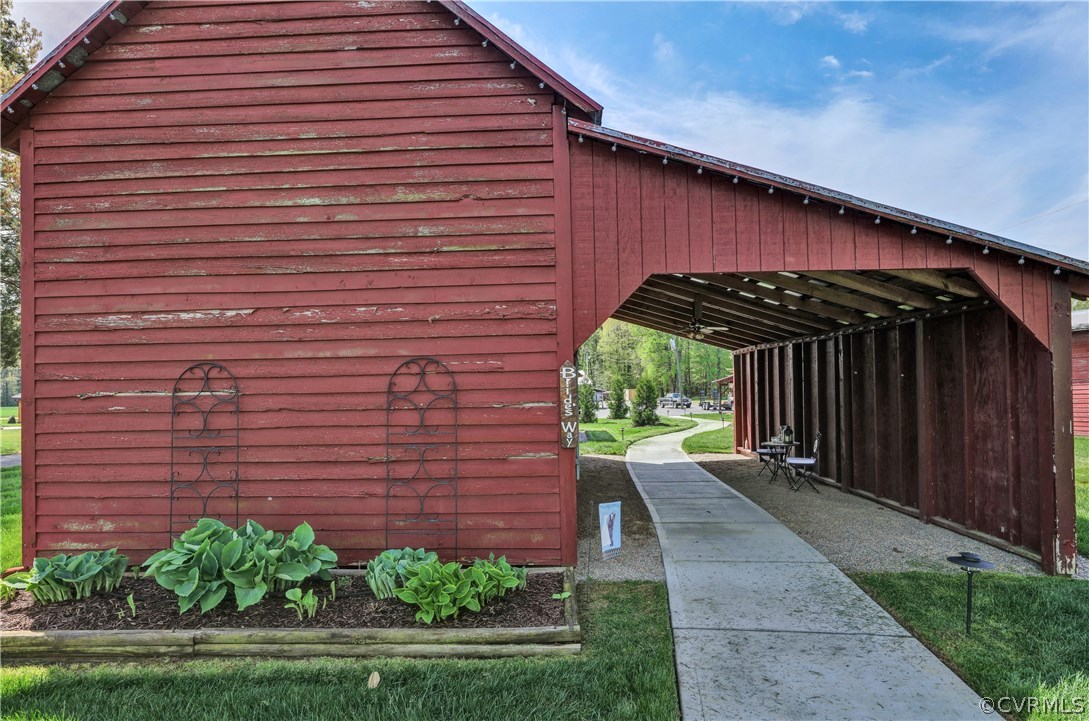 5503 Ruffin Road Prince George, VA 23875 - Photo 29 of 48 Paved paths wind around the gardens and through th