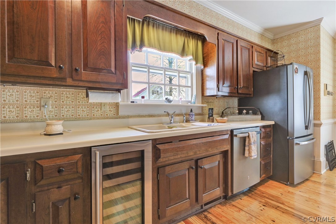 5503 Ruffin Road Prince George, VA 23875 - Photo 10 of 48 Updated appliances framed by custom cabinetry