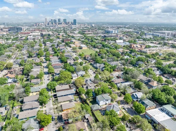 an aerial view of a city with lots of residential buildings