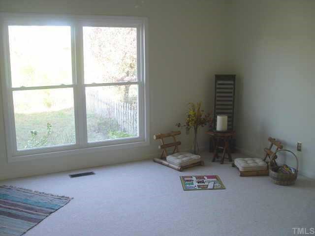 8811 Art Road Cedar Grove, NC 27231 - Photo 7 of 11 Kitchen opens to spacious family room.