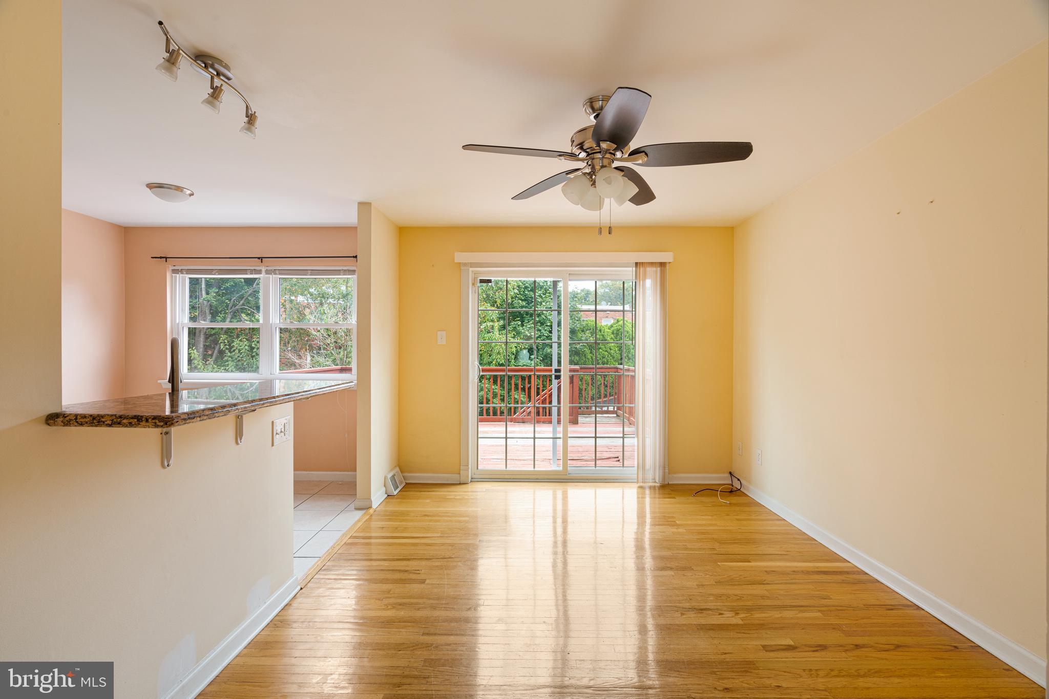 12541 Ramer Road Philadelphia, PA 19154 - Photo 9 of 38 Open Concept Dining and Kitchen w/ Sliders to Deck