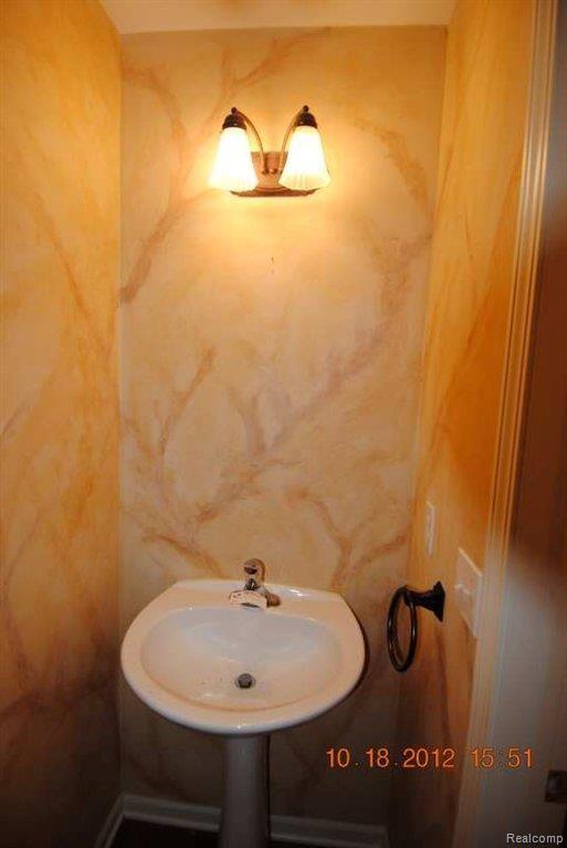 598 Ridge Point Drive Dundee, MI 48131 - Photo 8 of 16 Half Bathroom.JPG