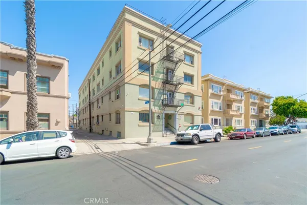 a cars parked in front of a building