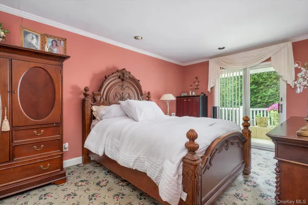 a bed room with a bed and a window