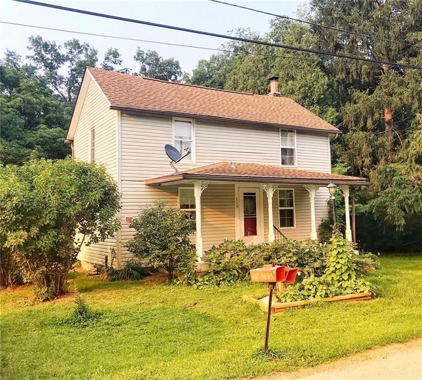 118 Vance Road New Castle, PA 16102 - Photo 1 of 18 a front view of a house with a yard