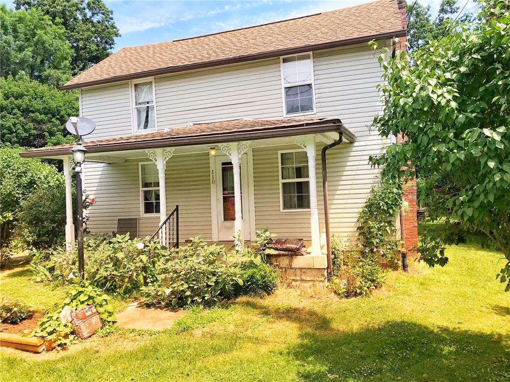118 Vance Road New Castle, PA 16102 - Photo 2 of 18 front view of a house with a yard
