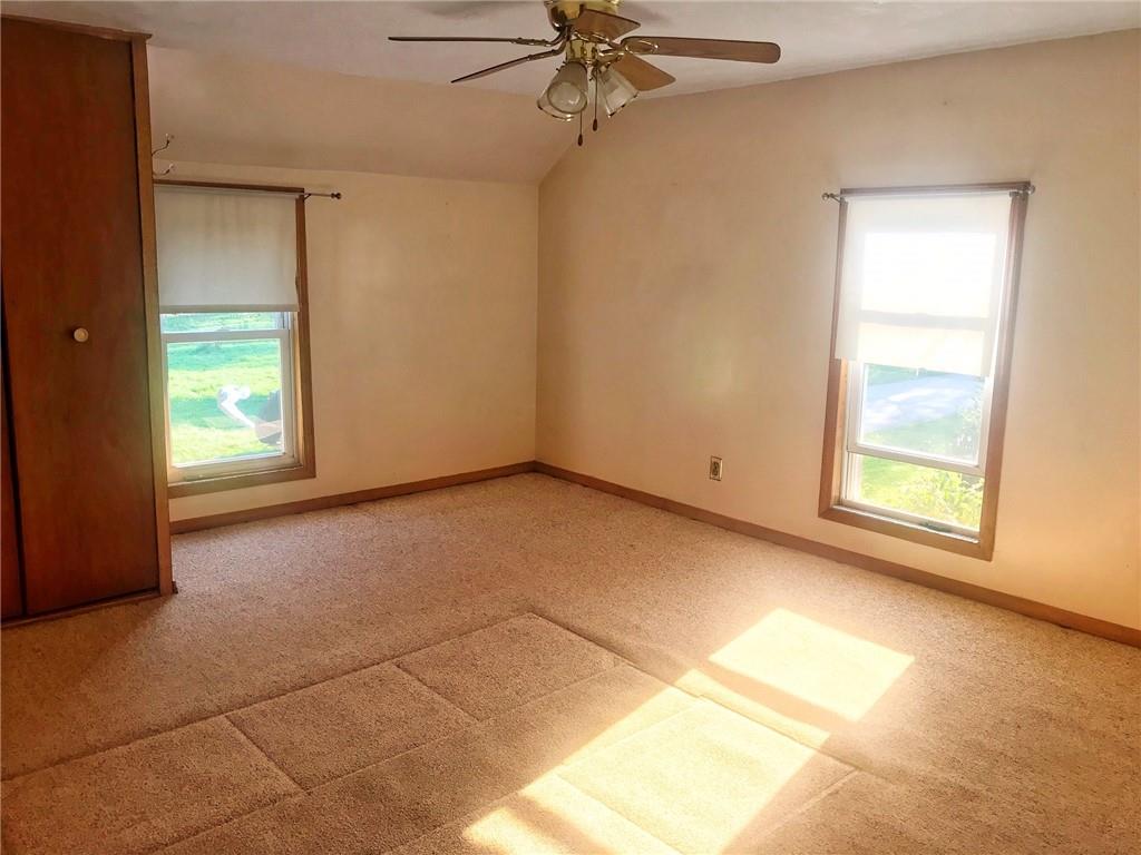 118 Vance Road New Castle, PA 16102 - Photo 13 of 18 an empty room with windows and closet