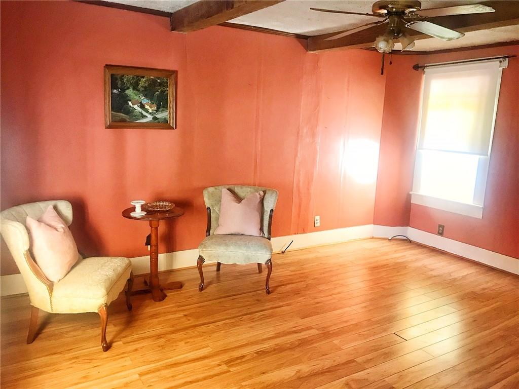 118 Vance Road New Castle, PA 16102 - Photo 8 of 18 a view of a livingroom with furniture and hardwood floor