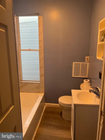 a bathroom with a sink and a toilet