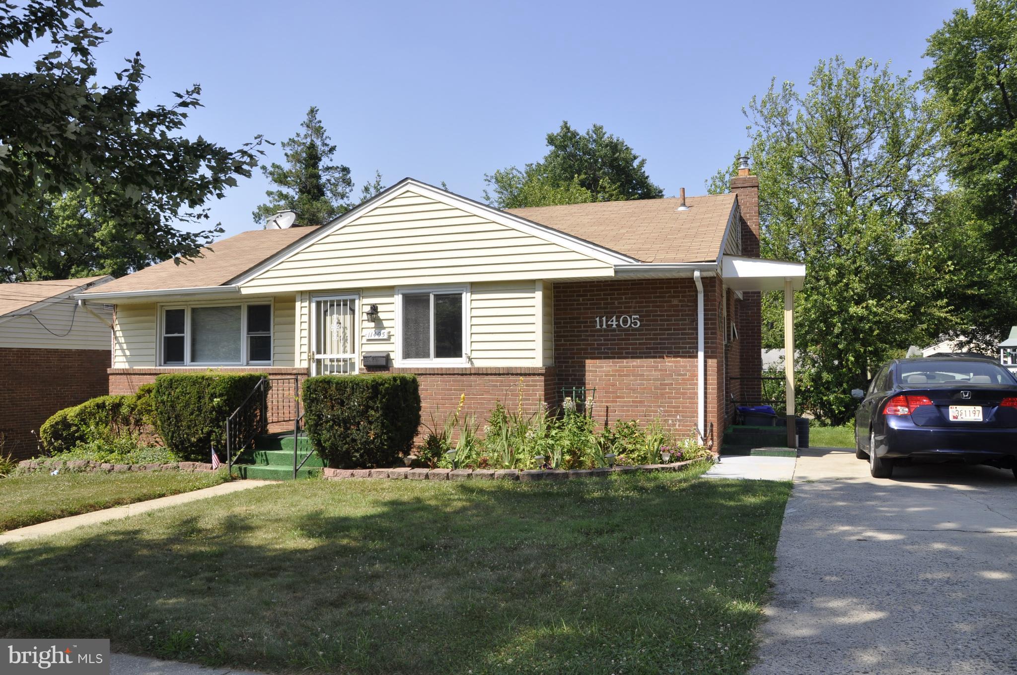 11405 Veirs Mill Road Wheaton, MD 20902 - Photo 2 of 24 2 car private drive w/ side entry