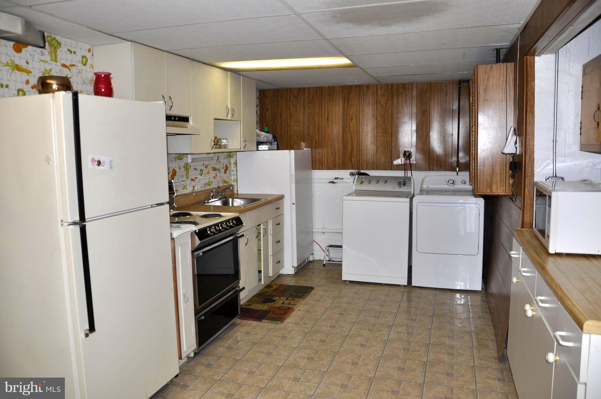 11405 Veirs Mill Road Wheaton, MD 20902 - Photo 19 of 24 Full In Law kitchen / Laundry