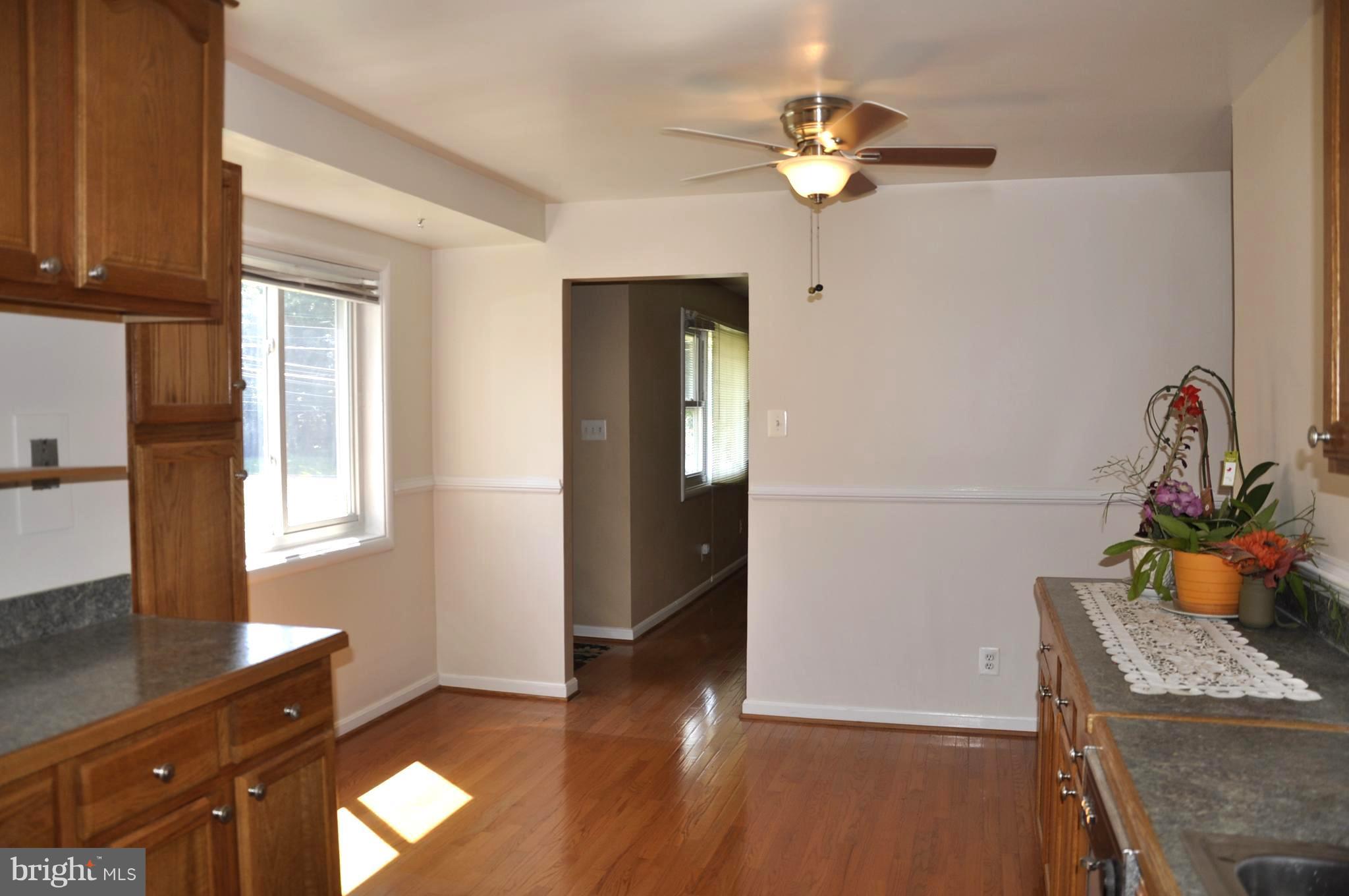 11405 Veirs Mill Road Wheaton, MD 20902 - Photo 5 of 24 Spacious open Kitchen/Dining Room, Hdwd Floors